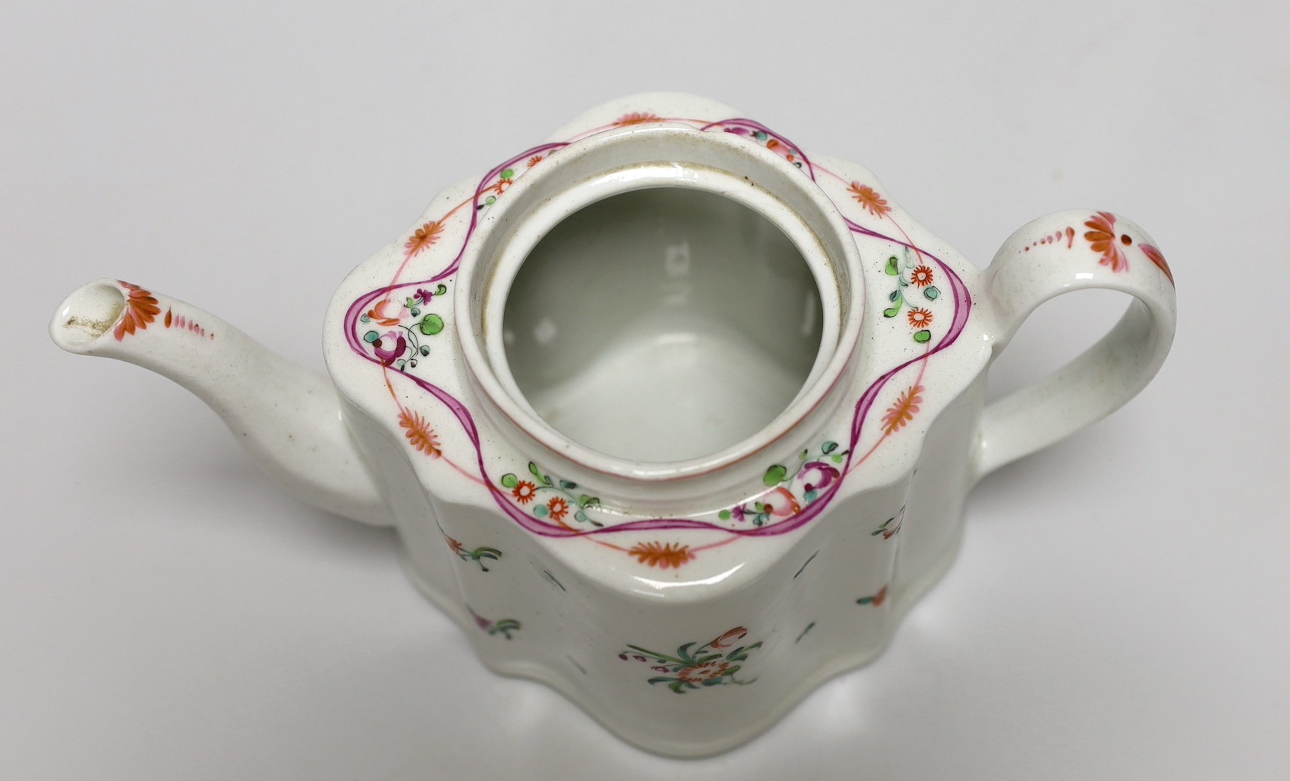 A late 18th century painted Newhall teapot and cover. 14.5cm high